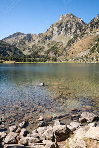 breathtaking beauty of Laurenti Lake in Ariege, Pyrenees, France, captured during summer.