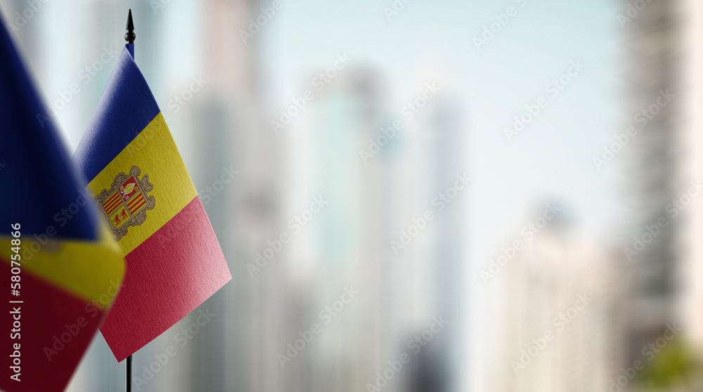 Obraz na płótnie A small Andorra flag on an abstract blurry background w salonie