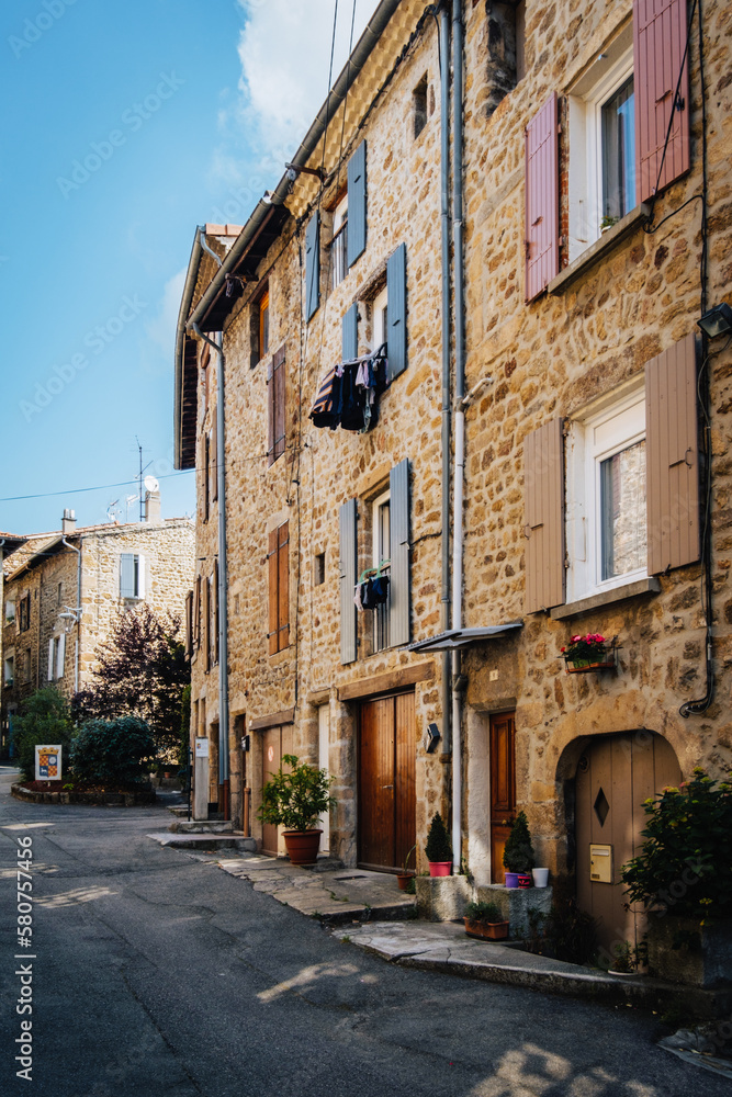 Quaint stone facades of old houses in the medieval village of Boulieu Les Annonay in the south of France (Ardeche)