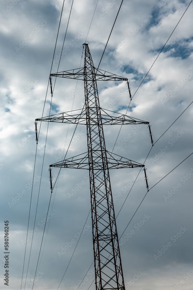 Electricity pylon with sky in background