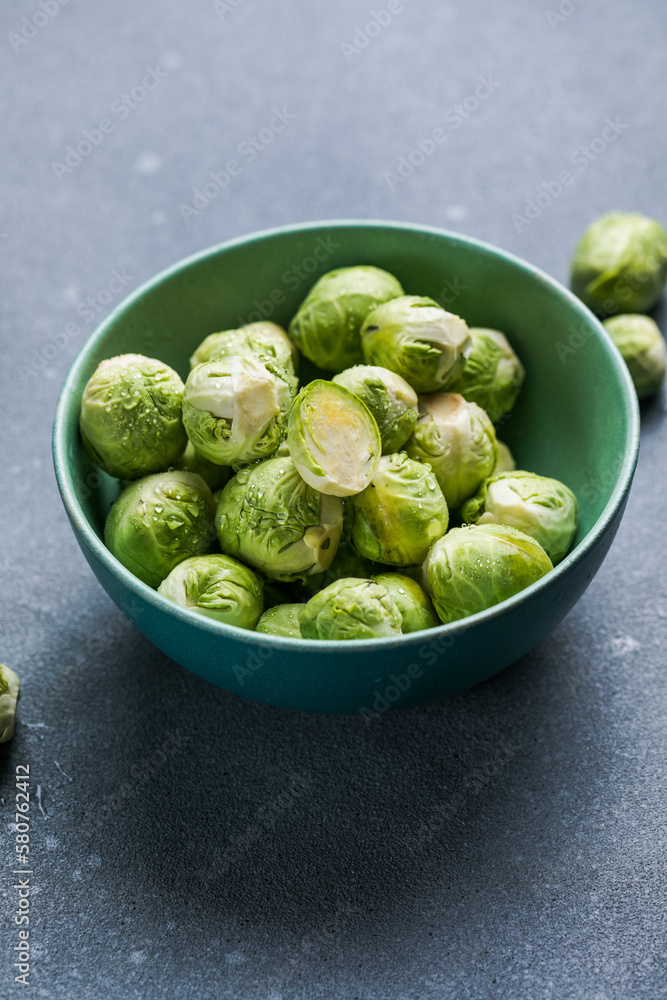 Raw Organic Brussel Sprouts in a Bowl, top view. Flat lay, overhead, from above. Copy space. Raw Organic Brussel Sprouts in a Bowl, top view. Flat lay, overhead, from above. Copy space.