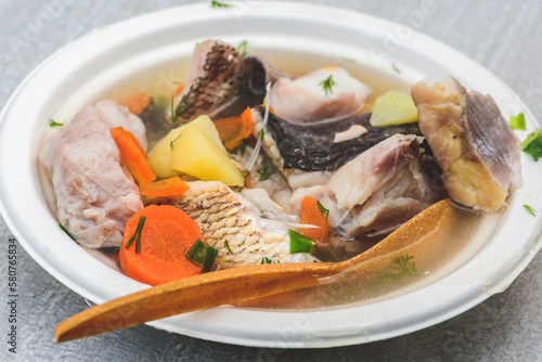 Hot fish soup with various vegetables in Kaziuko Muge or Saint Casimir's Fair, a spring annual folk arts and crafts fair in Vilnius, Lithuania, Europe, close up