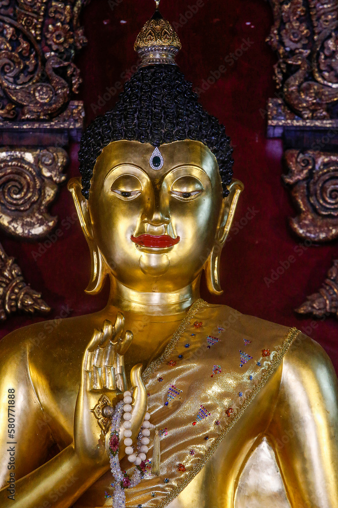 Detail of a Buddha statue in Wat Pan Sao, Chiang Mai. Thailand.