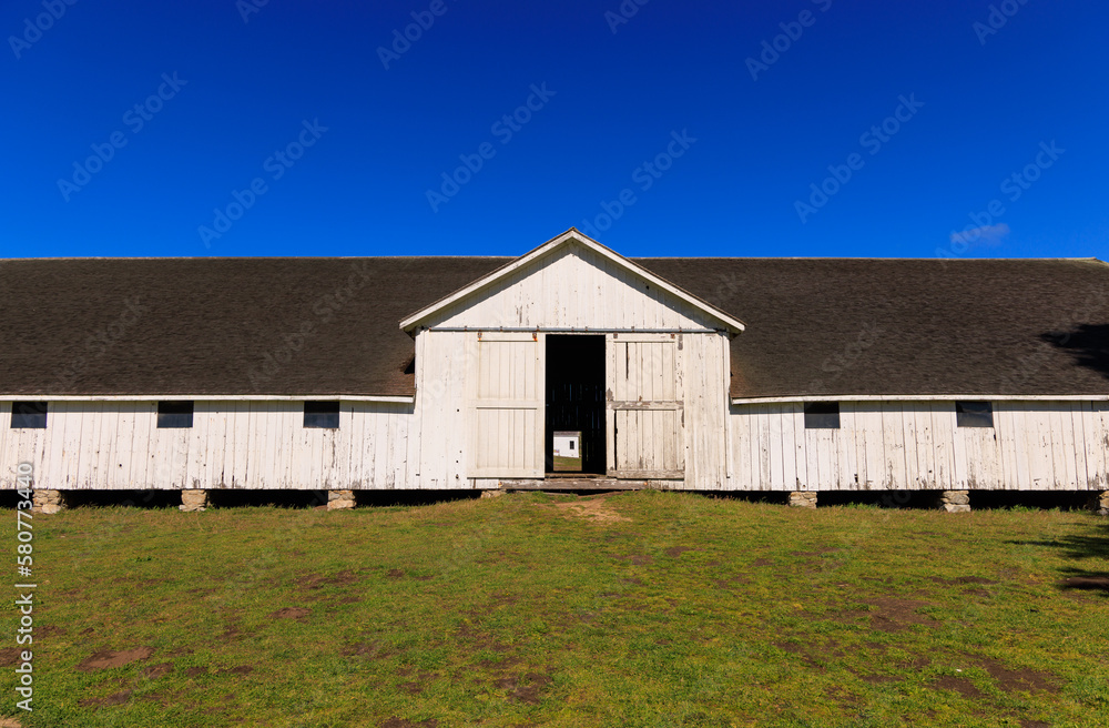 Historic wooden barn on rural dairy farm in Northern California Historic wooden barn on rural dairy farm in Northern California