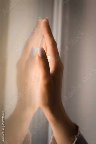 hands of a person with a window