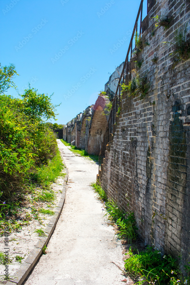 Curved walkway following the brick walls inside Fort Pickens