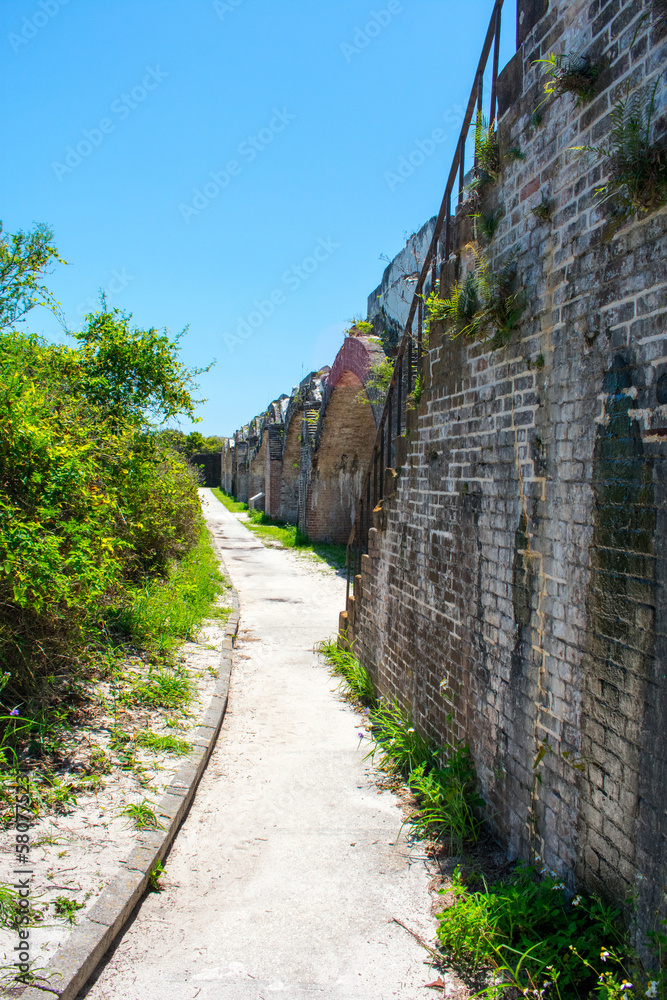 Curved walkway following the brick walls inside Fort Pickens Curved walkway following the brick walls inside Fort Pickens