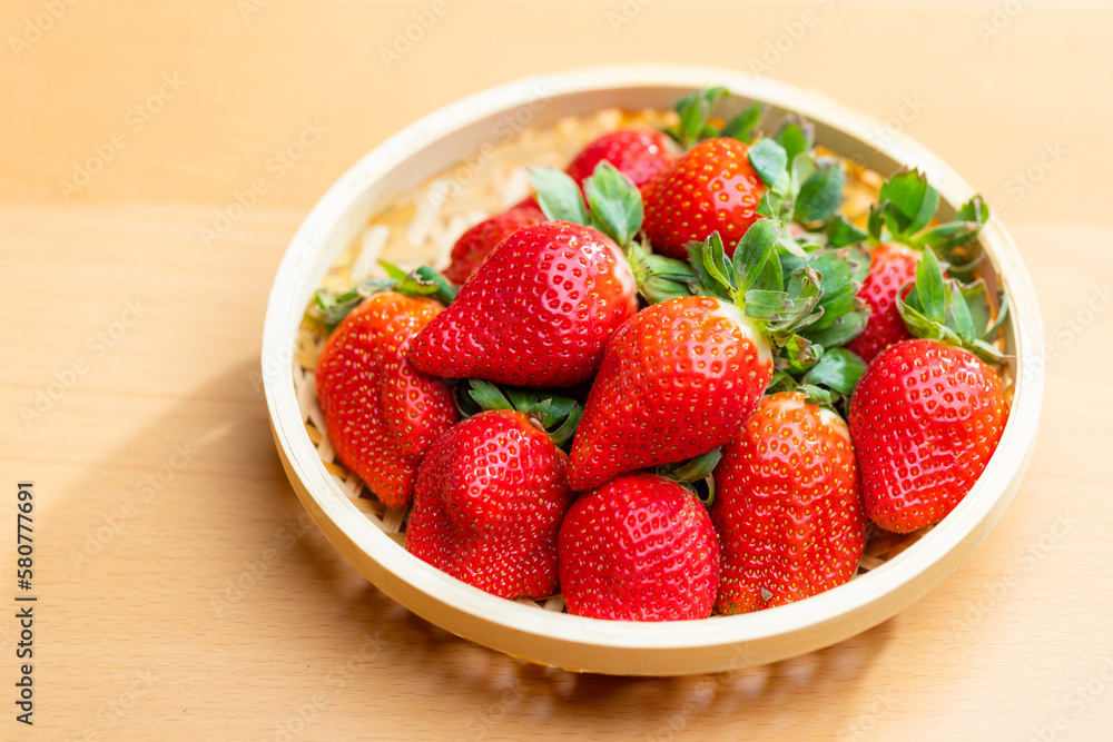 Ripe and luscious strawberries in a basket Ripe and luscious strawberries in a basket