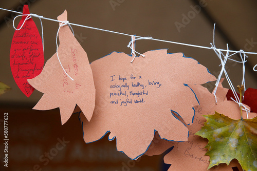 Peoples' Climate Summit - Sommet citoyen pour le climat in Montreuil, France. Messages and wishes written on leaves. France. photo