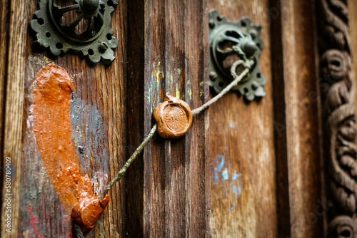 Wooden doors and inlaid door handles of Peles castle photo