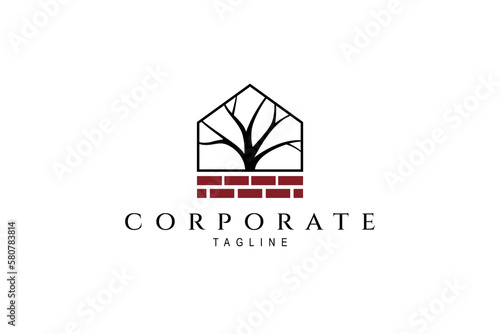 Abstract vector logo of a brick house with tree silhouette.