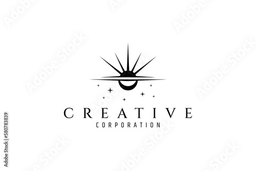 Logo design an abstract image of the moon and sun on a star background.