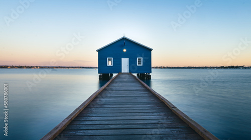 The beautiful blue boat house. The image was taken shortly after sundown. A long walk way leading the eye to the structure. An abundance of blues and a amber glow on the horizon.  © Sam Jeffs
