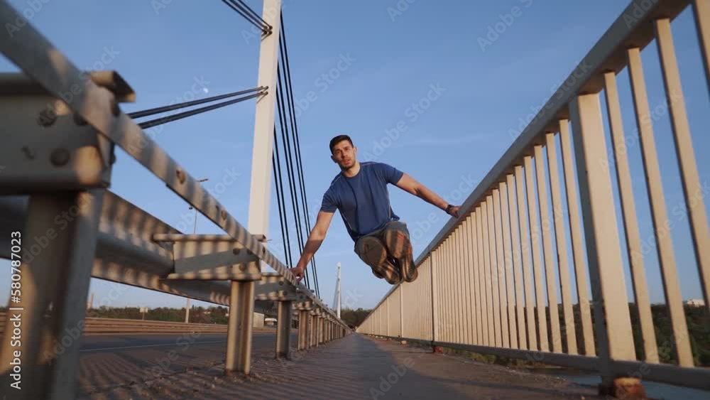 Sports and healthy lifestyle. Young man training in city. Young athletic man doing push ups outdoors. Sports and healthy lifestyle. Young man training in city. Young athletic man doing push ups outdoors.