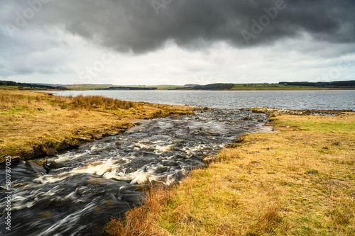Burn enters Derwent Reservoir. The River Derwent formed in the North Pennines and flows through its reservoir between the boundaries of Durham and Northumberland as a tributary of the River Tyne