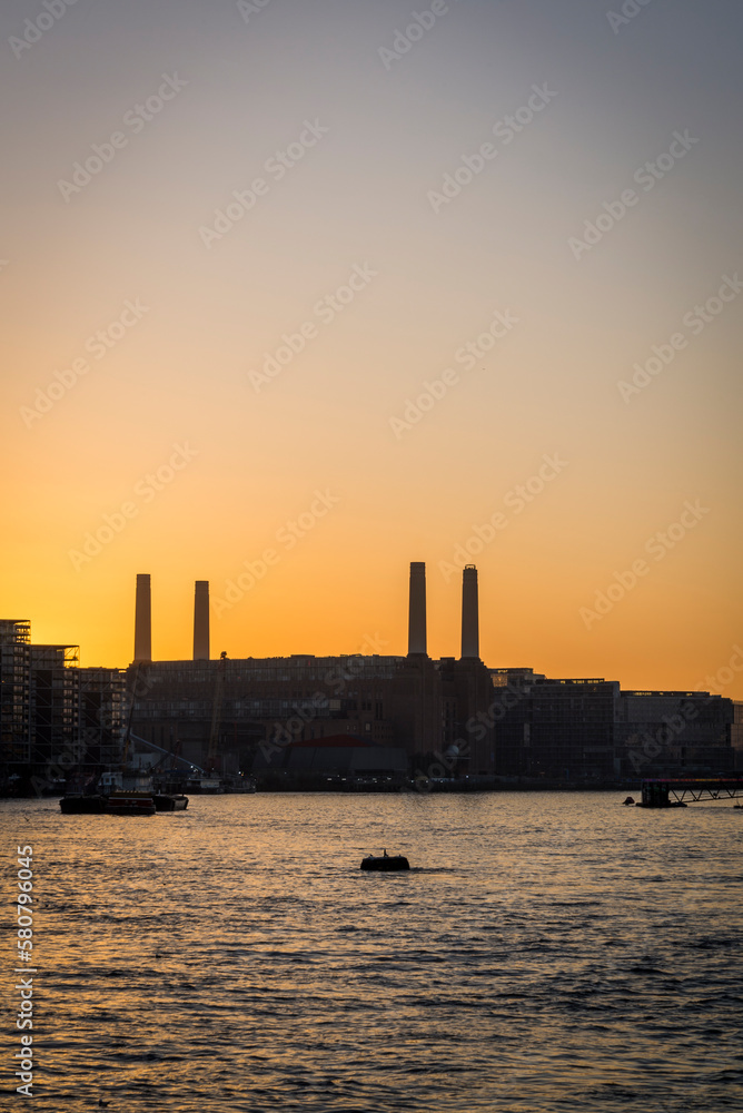 View of silhouetted Battersea Power Station at sunset over the river Thames from Vauxhall, London, England, UK View of silhouetted Battersea Power Station at sunset over the river Thames from Vauxhall, London, England, UK