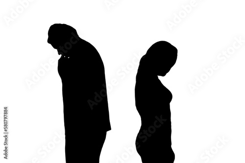 Silhouette of sad man and woman in a quarrel, isolated on a white background. Divorce of husband and wife in the evening light of the home living room