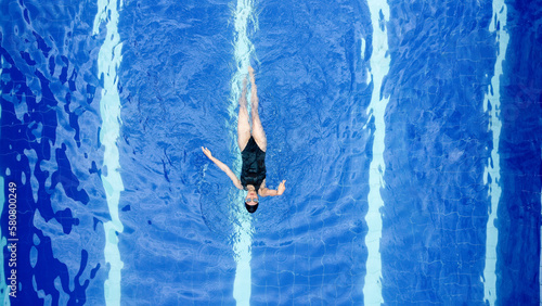 Girl Solo Swimming on a pool
