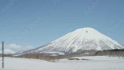 Mount Yotei, snowy mountains, time-lapse video, clouds flowing through the mountains, nature in Japan
