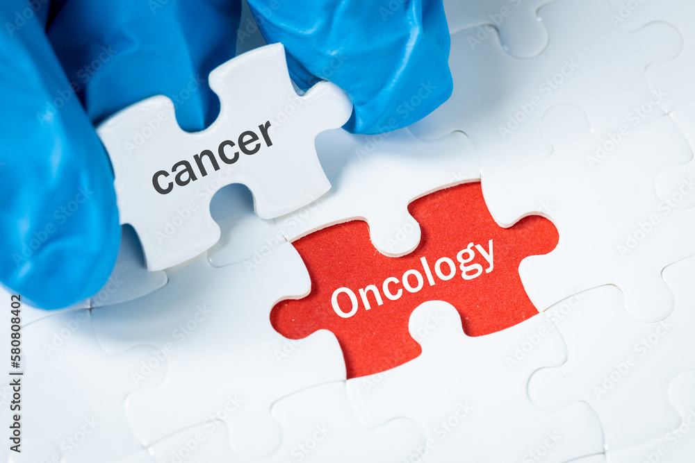 Φωτογραφία Cancer and oncology, Health concept, Puzzle with the text Cancer unveils a red b