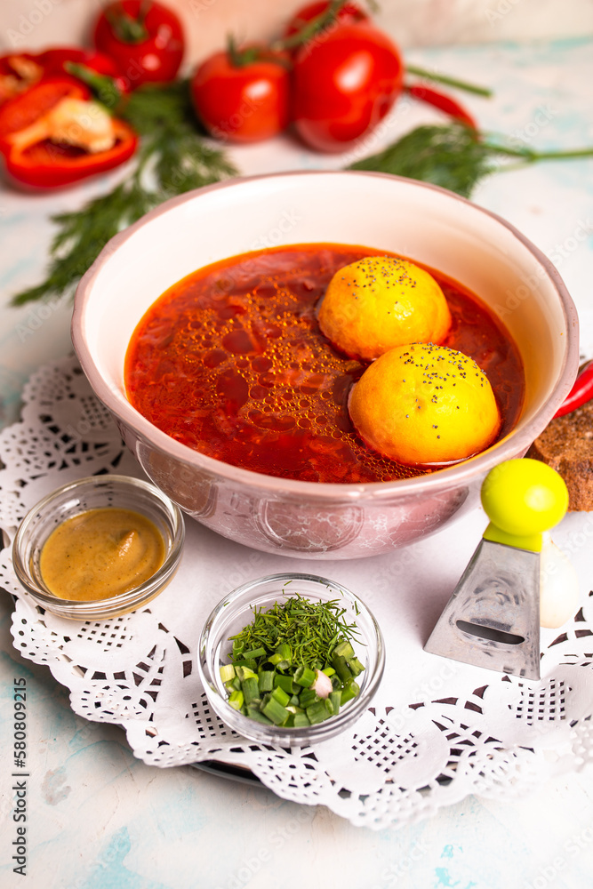 borscht with pampushki and garlic in the restaurant borscht with pampushki and garlic in the restaurant