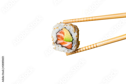 Salmon uramaki grabbed by wooden chopsticks with trasparent background