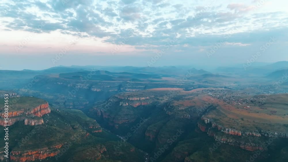 Aerial view of Blyde River Canyon with low clouds, a natural attraction with mountains and wildlife, South Africa. Aerial view of Blyde River Canyon with low clouds, a natural attraction with mountains and wildlife, South Africa.