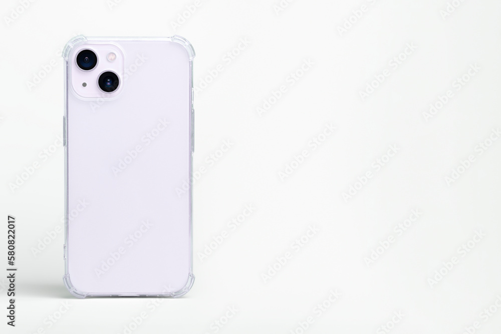purple iPhone 14 in clear transparent soft silicone case back view. Phone case mockup isolated on gray background. Banner with place for text on the right purple iPhone 14 in clear transparent soft silicone case back view. Phone case mockup isolated on gray background. Banner with place for text on the right