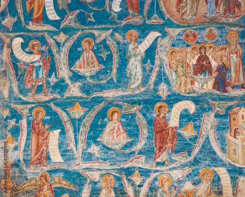 Religious paintings on the wall of Voronet monastery - Romania photo