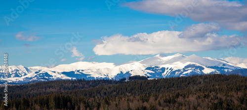 Landscape with snow-covered mountains in the distance