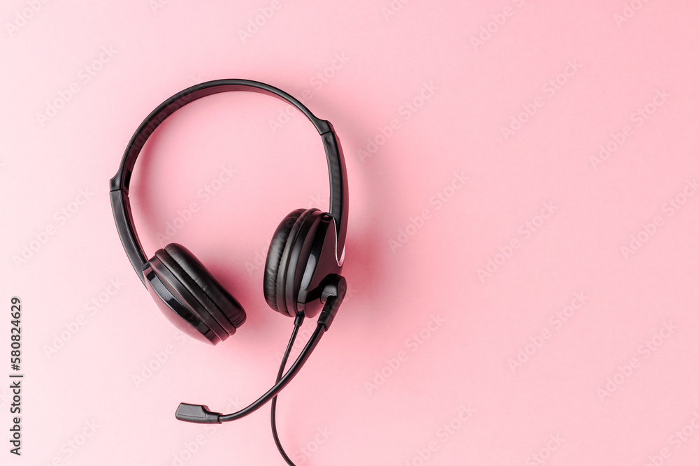 Overheadshot of headset on background with copyspace. Call center concept Overheadshot of headset on background with copyspace. Call center concept