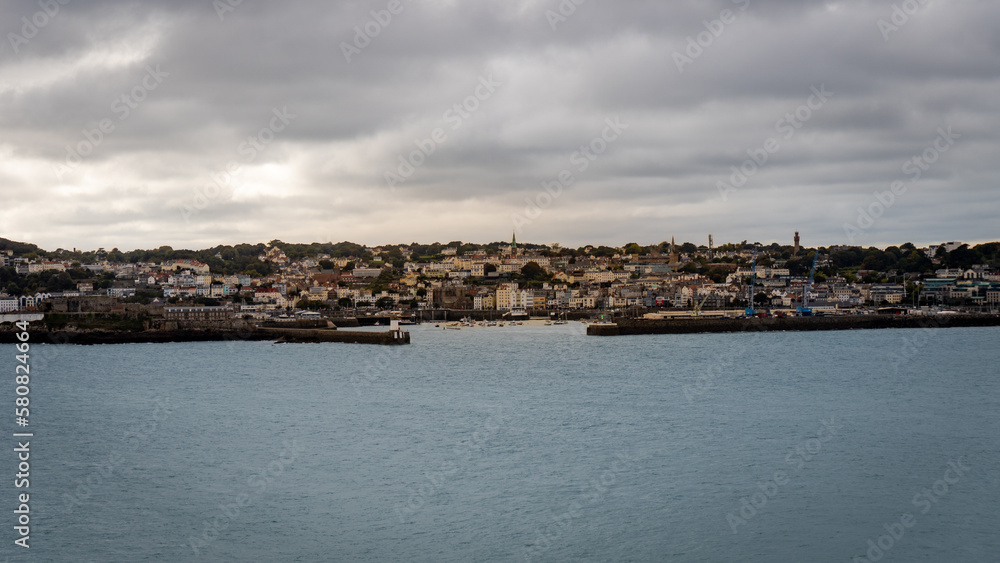 St. Peter Port (Saint-Pierre Port), Guernsey, United Kingdom. Town and parish on island of Guernsey in Channel Islands. Capital of Bailiwick of Guernsey and main port.