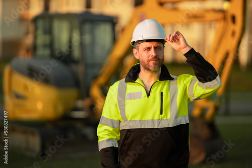 Quadro su tela Builder on excavator