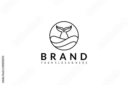 whale tail logo appears on the sea surface in a circle frame