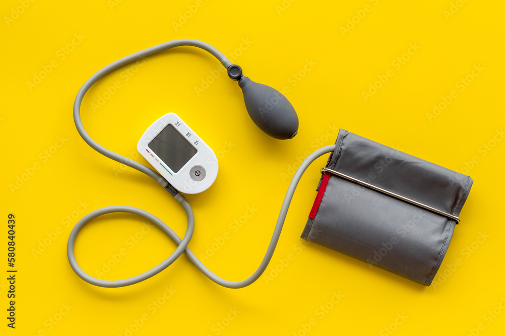 Heart diseases diagnosis concept with blood pressure monitor Heart diseases diagnosis concept with blood pressure monitor