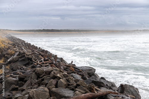 Rocky Oregon Coast along Pacific Ocean on a Cloudy Day at Columbia River South Jetty