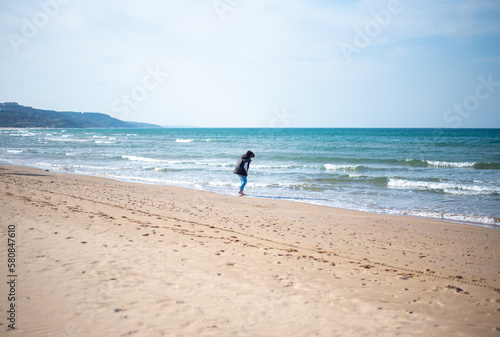 lonely woman on the beach