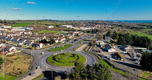 Aerial view of Residential homes and business in Millbrook Larne in County Antrim Northern Ireland