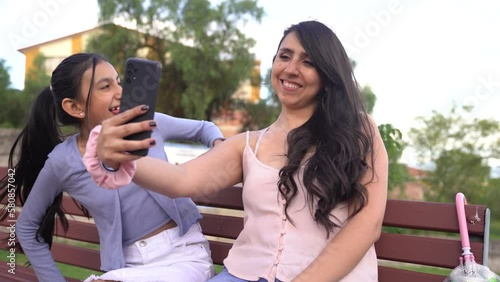 Wallpaper Mural mother and daughter taking selfies outdoors Torontodigital.ca