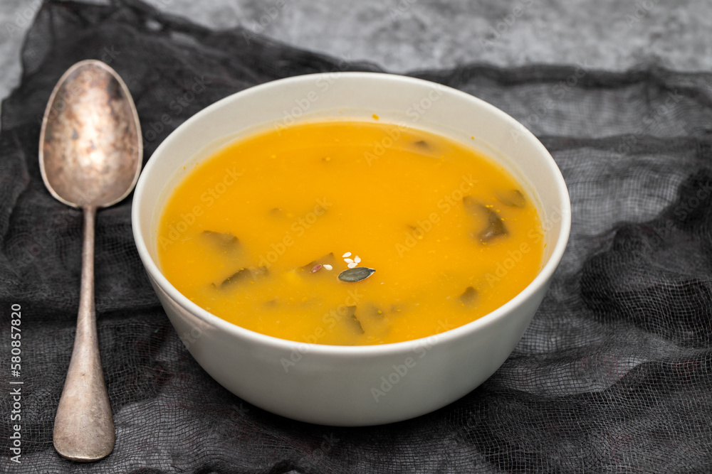 Vegetable cream soup with spinach in small bowl Vegetable cream soup with spinach in small bowl