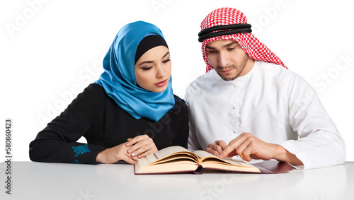 Arabian muslim couple reading Quran photo