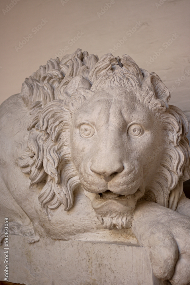 Sculpture of a lying lion in a museum in Italy