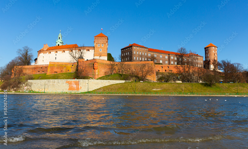View of medieval Wawel castle on Vistula River at sunny spring day, Krakow, Poland