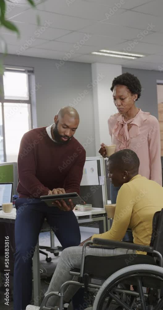 Vertical video of african american business people and disabled woman talking in slow motion Vertical video of african american business people and disabled woman talking in slow motion