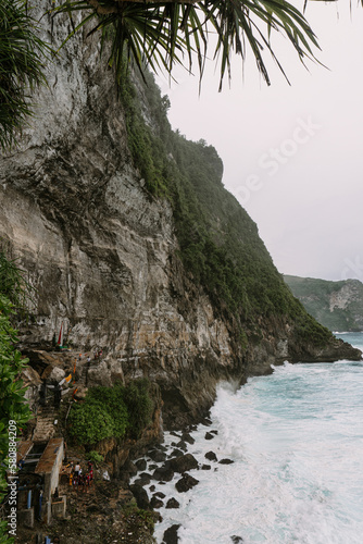 Natural views of Nusa Penida. Rocks and ocean. Peguyangan temple in Nusa Penida Island - Bali. Peguyangan Waterfall photo