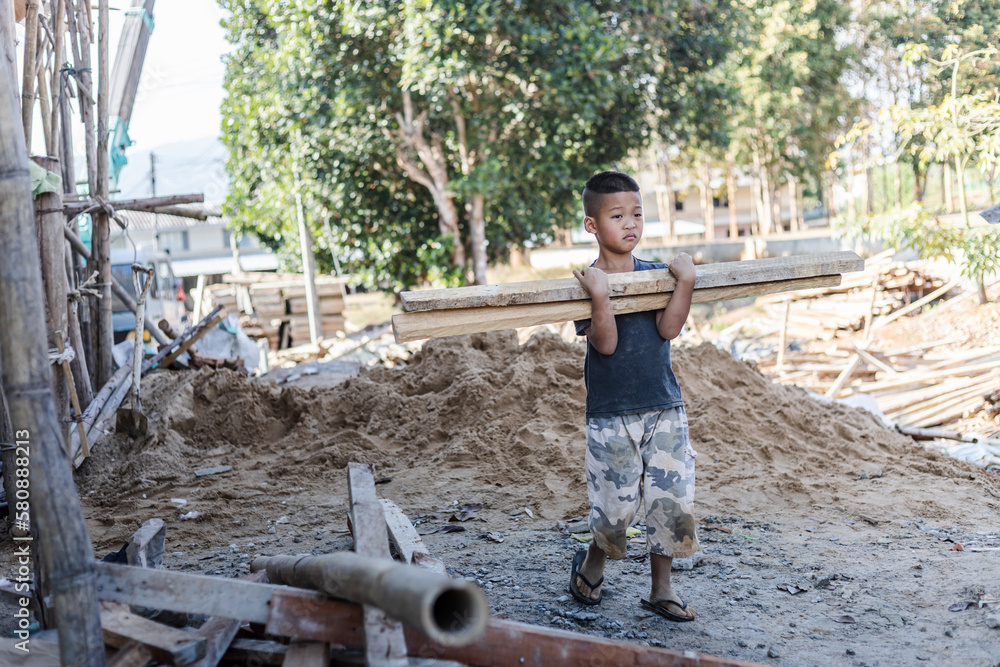 Children working at construction site for world day against child labor concept: Children working at construction site for world day against child labor concept: