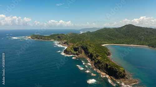 The coast of the island with beaches and rainforest. Cape Engano. Palaui Island. Santa Ana Philippines. photo