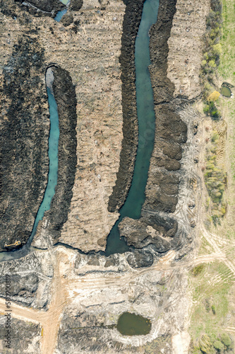 marshland drainage and meliorative works. reclamation ditches. aerial top view. photo