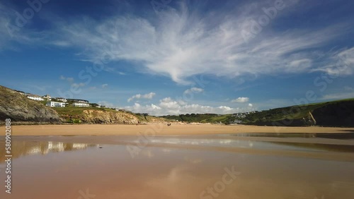 Mawgan Porth Beach, Cornwall - looking towards the dunes and hamlet.  Real time. photo