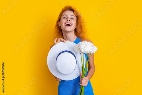 photo of glad beauty girl with march aster flowers. beauty girl with march flowers